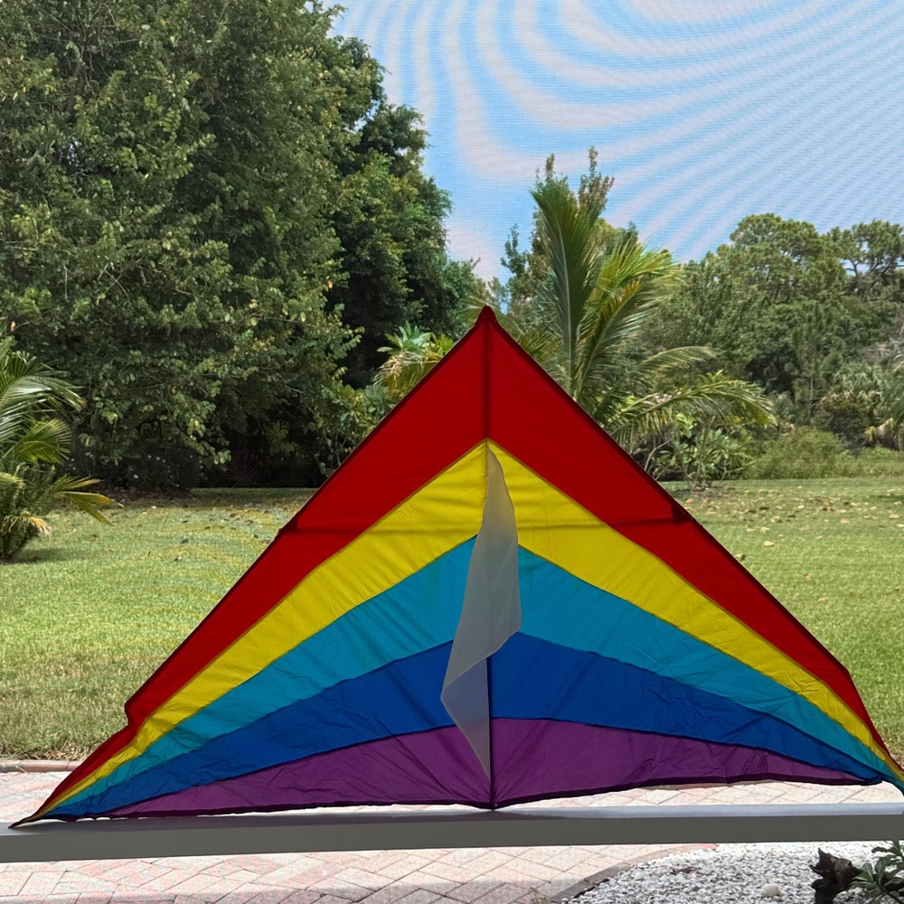 Vintage rainbow colored delta kite, circa 1980’s.